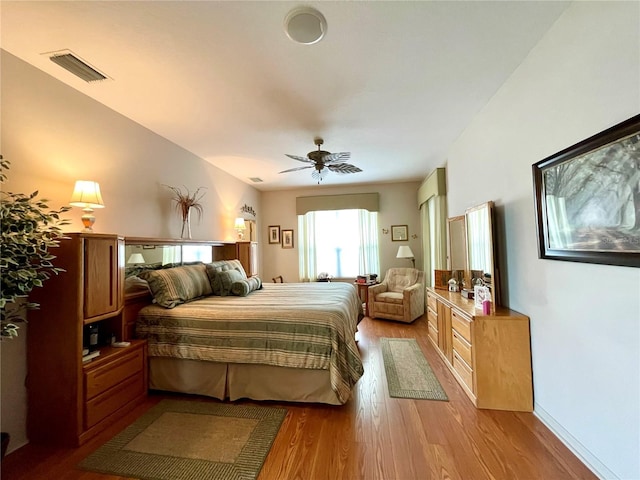 bedroom featuring ceiling fan and light wood-type flooring