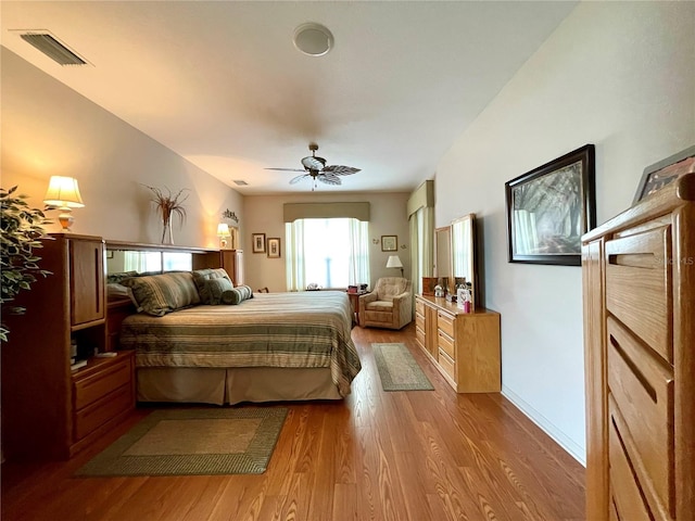 bedroom featuring light hardwood / wood-style flooring and ceiling fan