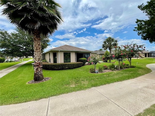 exterior space with a front yard