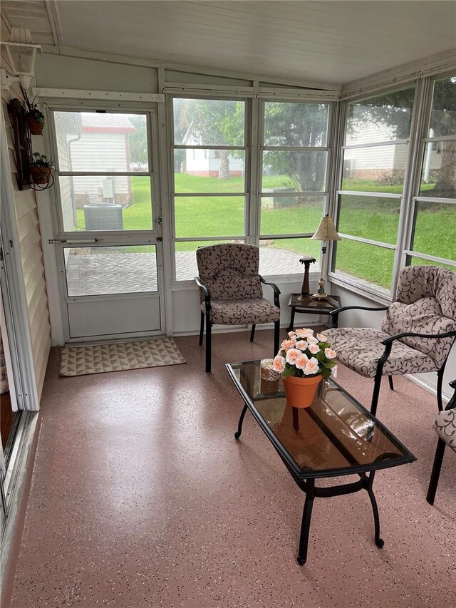 sunroom with vaulted ceiling