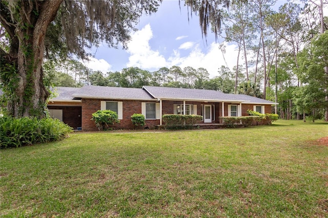 ranch-style home with a front yard