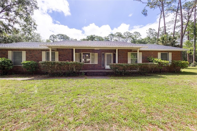 ranch-style house with a front yard