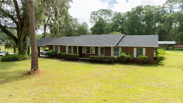 ranch-style house with a carport and a front yard