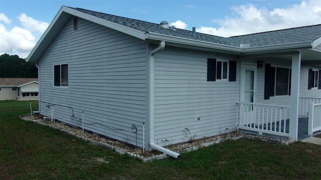 view of property exterior featuring a yard