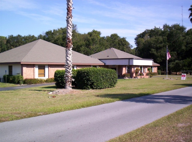 view of front of property with a front lawn