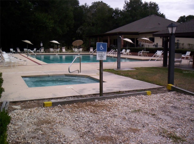 view of pool featuring a patio