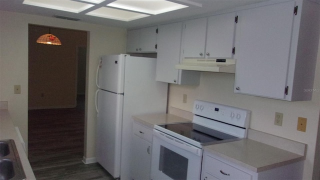 kitchen featuring sink, dark hardwood / wood-style flooring, pendant lighting, white appliances, and white cabinets