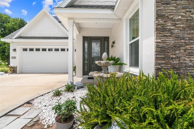 entrance to property featuring a garage