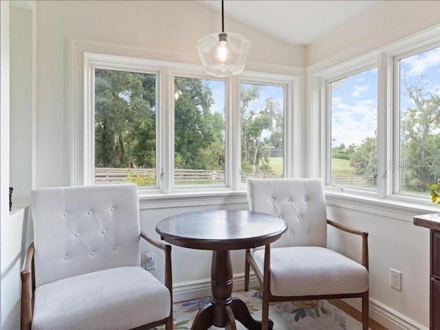 sunroom / solarium featuring a healthy amount of sunlight