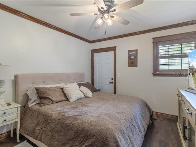 bedroom with ceiling fan, dark wood-type flooring, and ornamental molding