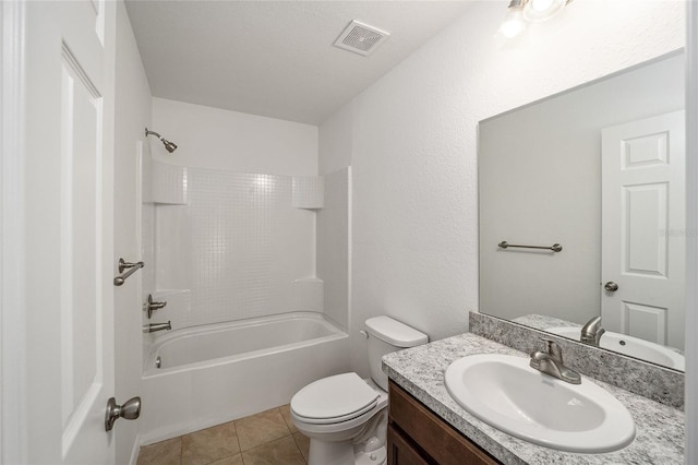 full bathroom with vanity, bathing tub / shower combination, tile patterned floors, toilet, and a textured ceiling