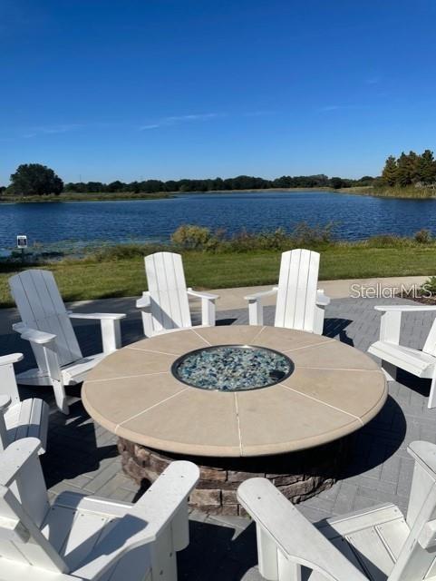 view of patio / terrace featuring a water view