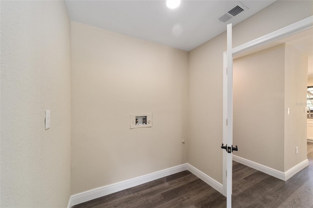 washroom with washer hookup, dark hardwood / wood-style floors, and electric dryer hookup