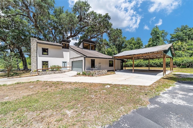 view of front of property with a carport