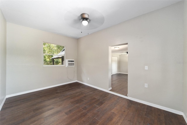 empty room featuring dark hardwood / wood-style flooring