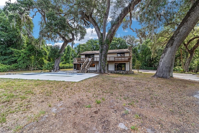 view of yard featuring a wooden deck