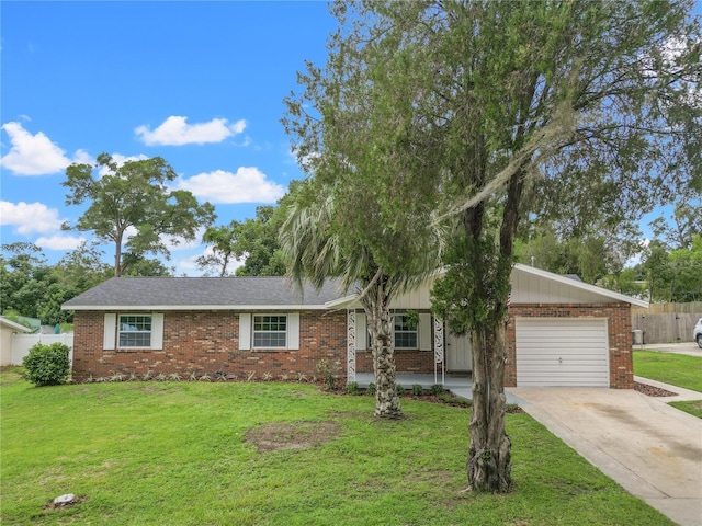 ranch-style house with a front lawn and a garage