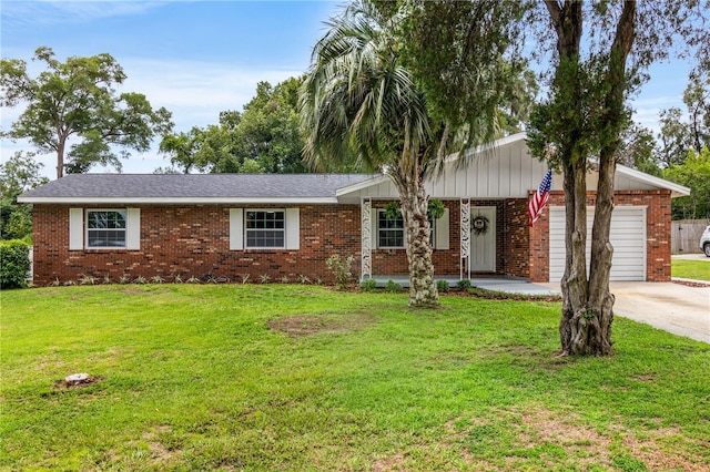 single story home with a front yard and a garage