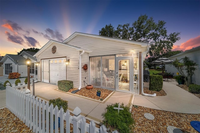 view of front of home with a garage