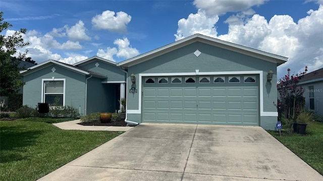 ranch-style home with a garage and a front lawn