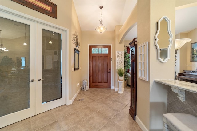 tiled foyer with french doors