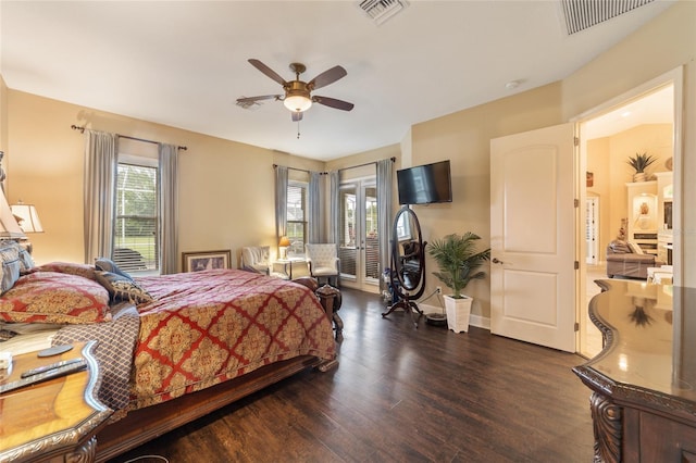 bedroom featuring ceiling fan, french doors, and dark hardwood / wood-style flooring