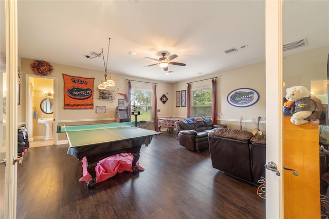 rec room featuring ceiling fan and dark hardwood / wood-style floors