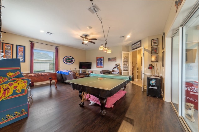 rec room with pool table, ceiling fan, and dark hardwood / wood-style flooring