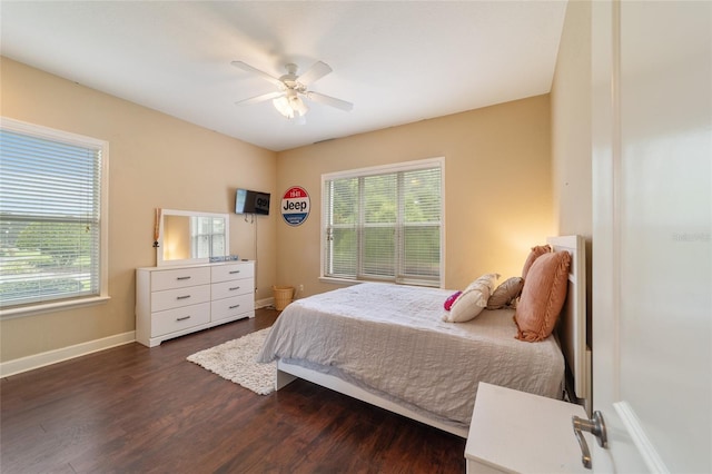 bedroom featuring ceiling fan and dark hardwood / wood-style floors