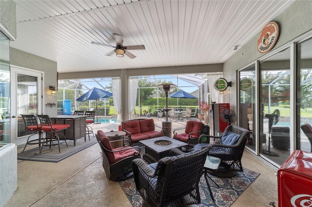 sunroom / solarium with ceiling fan