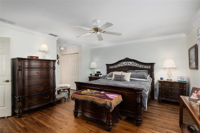 bedroom featuring dark hardwood / wood-style flooring, ceiling fan, a closet, and ornamental molding