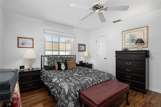 bedroom with dark hardwood / wood-style floors, ceiling fan, and ornamental molding