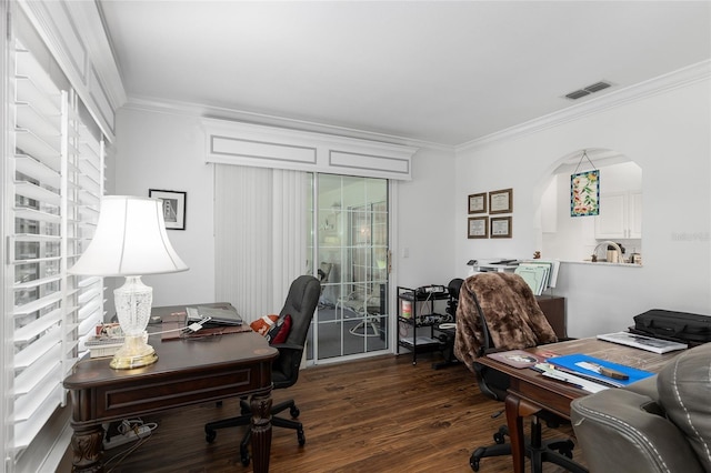 home office featuring dark hardwood / wood-style flooring and crown molding