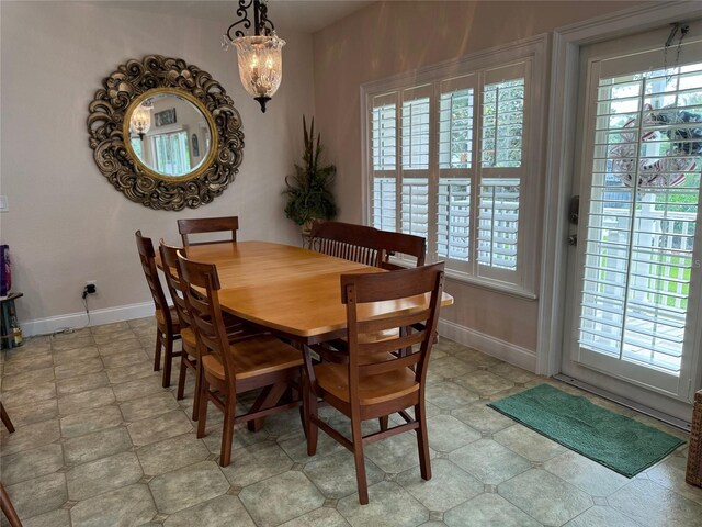 dining area with a chandelier