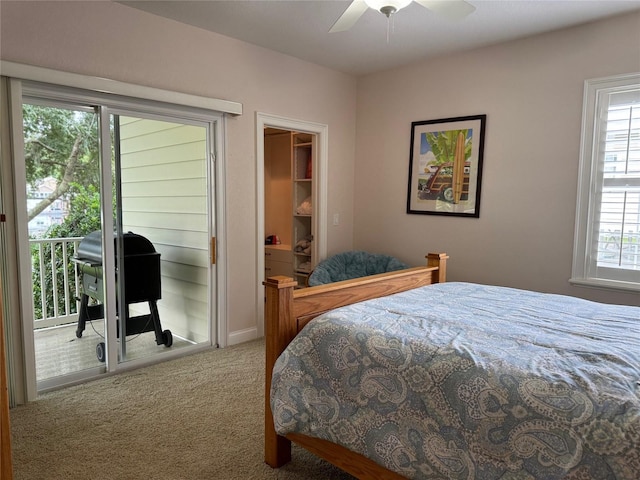 bedroom with carpet flooring, ceiling fan, and access to outside