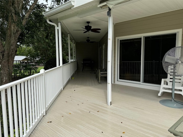 wooden terrace with ceiling fan