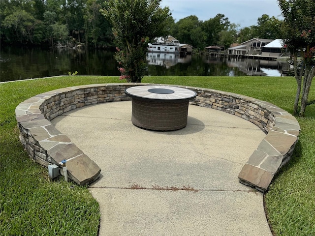 view of patio / terrace featuring a water view