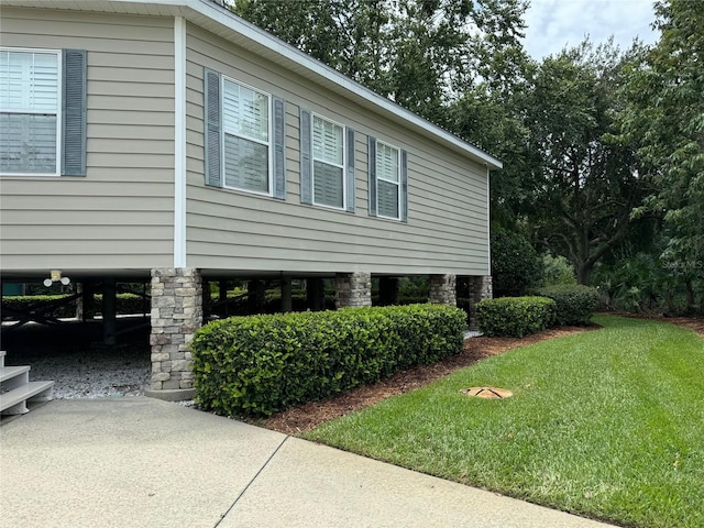 view of home's exterior featuring a yard