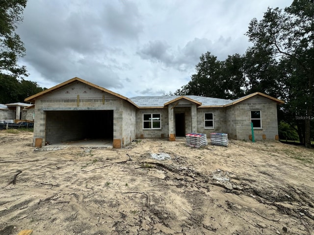 property under construction with a garage