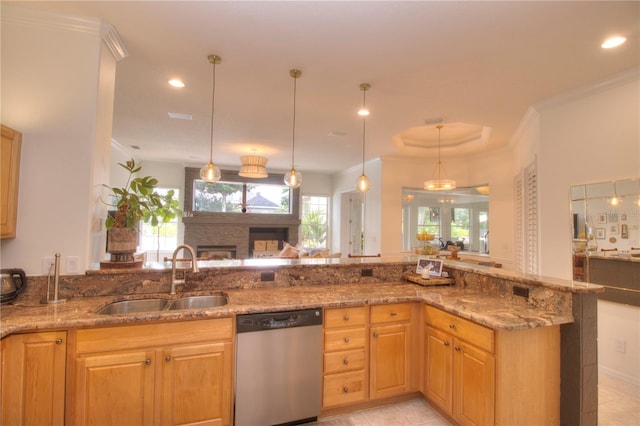 kitchen featuring light stone countertops, sink, and stainless steel dishwasher