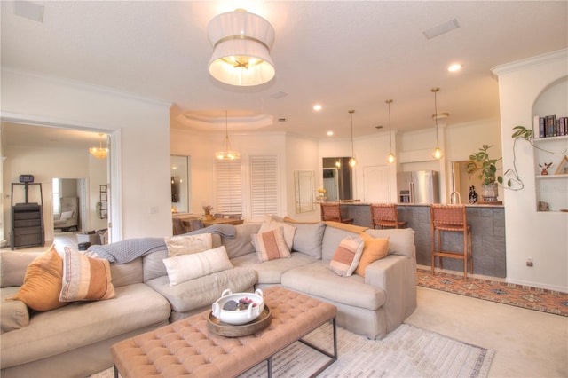 carpeted living room featuring crown molding