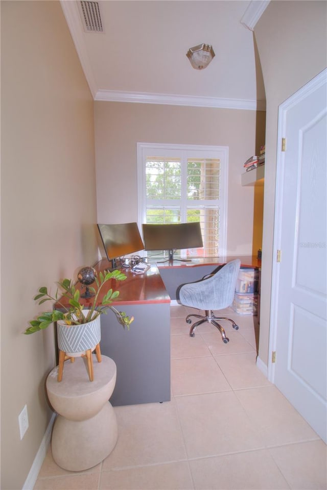 office area featuring ornamental molding and light tile patterned floors