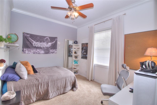 carpeted bedroom with crown molding and ceiling fan