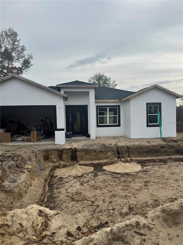 view of front of home featuring a garage