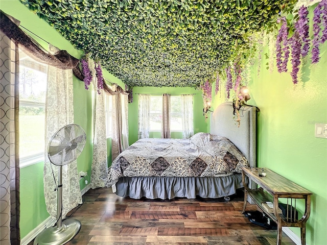 bedroom featuring dark wood-type flooring