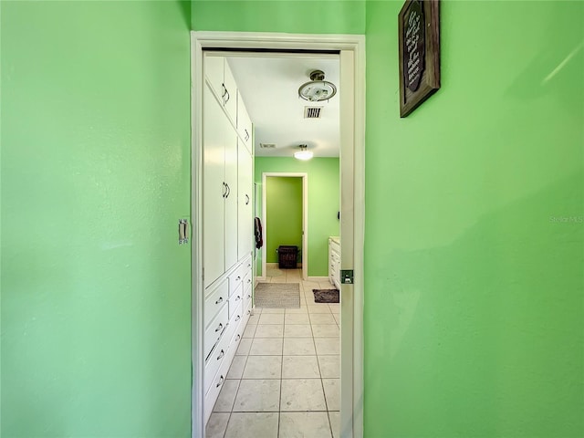 hallway with light tile patterned floors