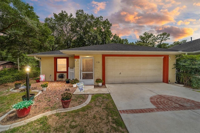 view of front of home featuring a garage