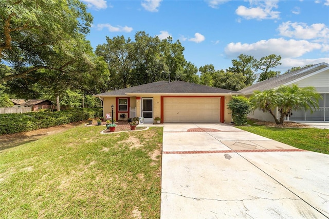 single story home with a front lawn and a garage