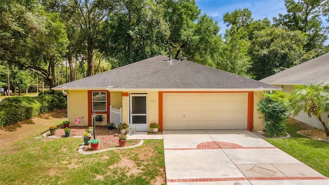 ranch-style home with a garage and a front yard