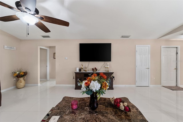 living room with light tile patterned floors